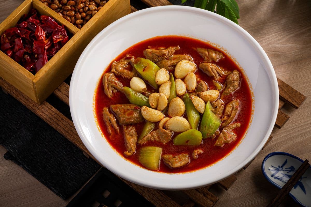 Stewed Pork Intestine with Lettuce Head (江油肥肠)