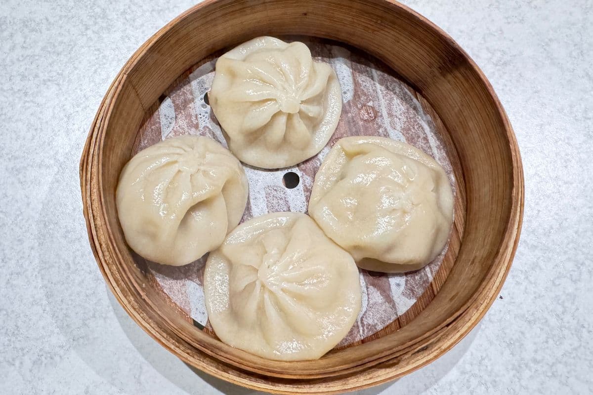 11. Steamed Juice Pork Bun (4 pcs)