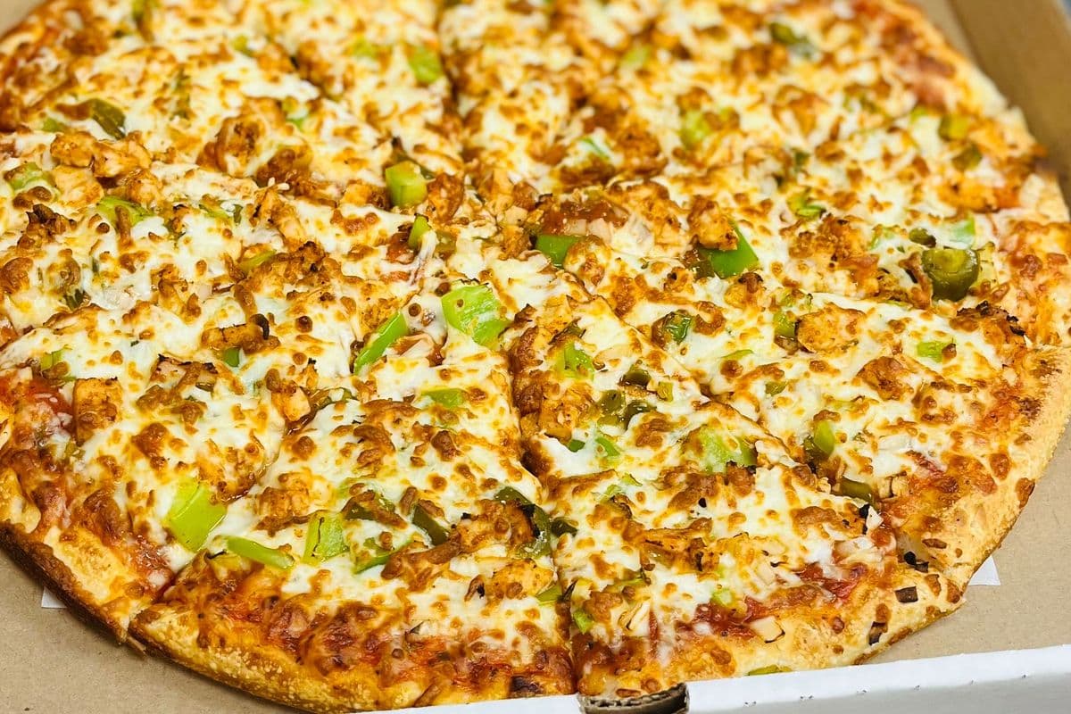 12" Medium Signature Tandoori Chicken Pizza and Choice of Second Pizza