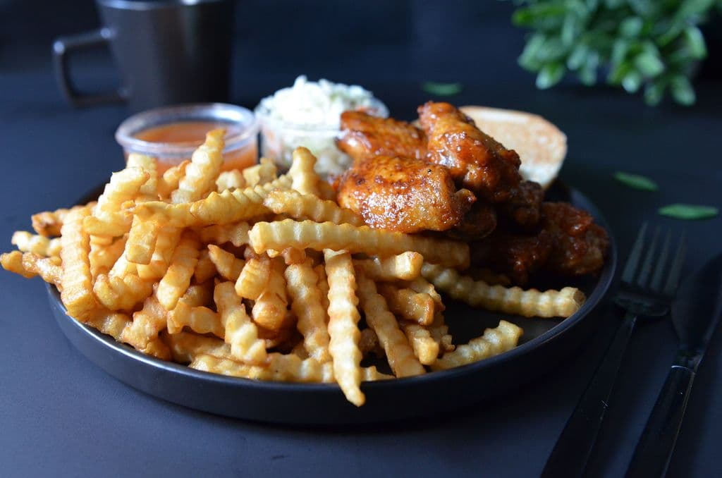 Ailes de poulet en repas