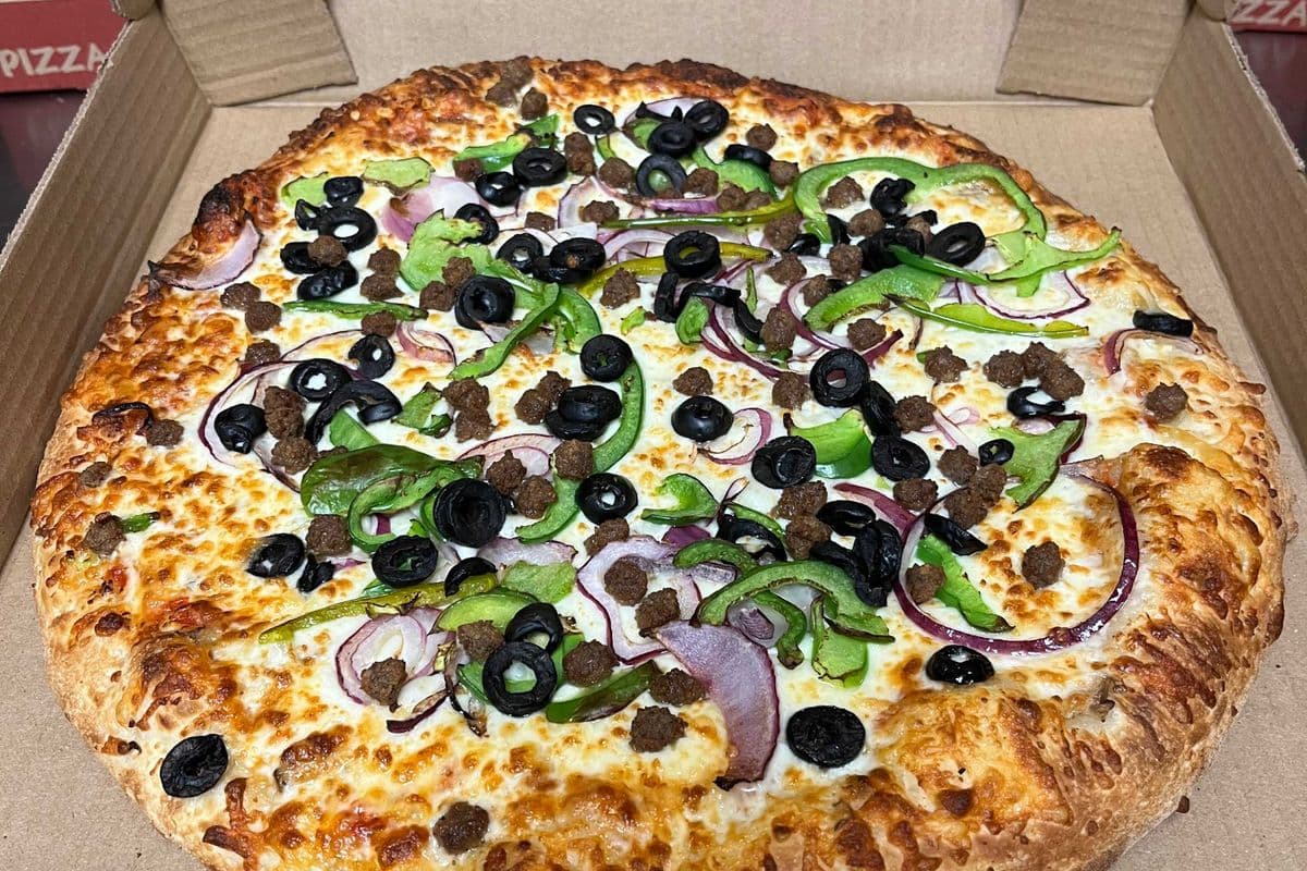 > 1 X Champion Special 14" Pizza