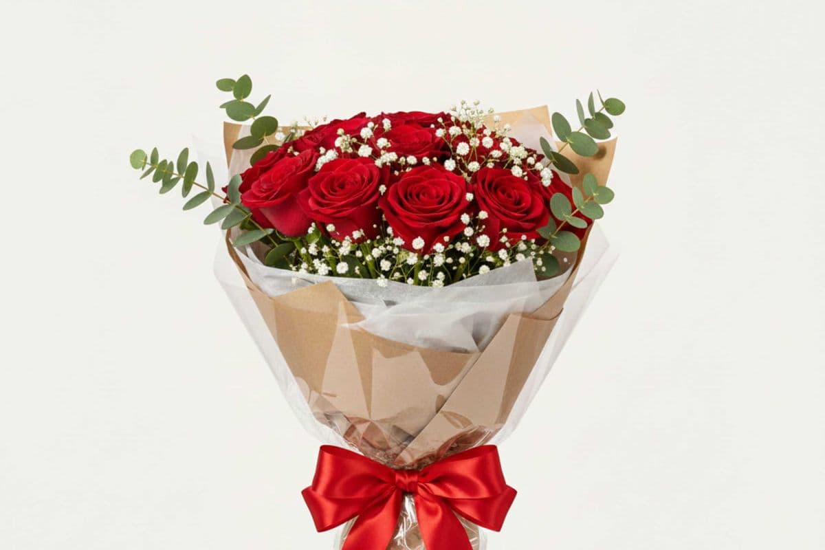 12 Roses Wrapped With Babies Breath $84.95- Colour options and vase add on available