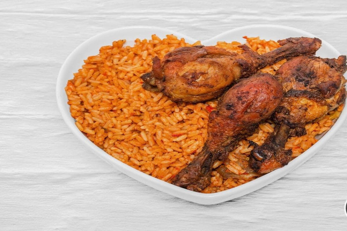 Jollof and Fried Rice Combo Served with Chicken