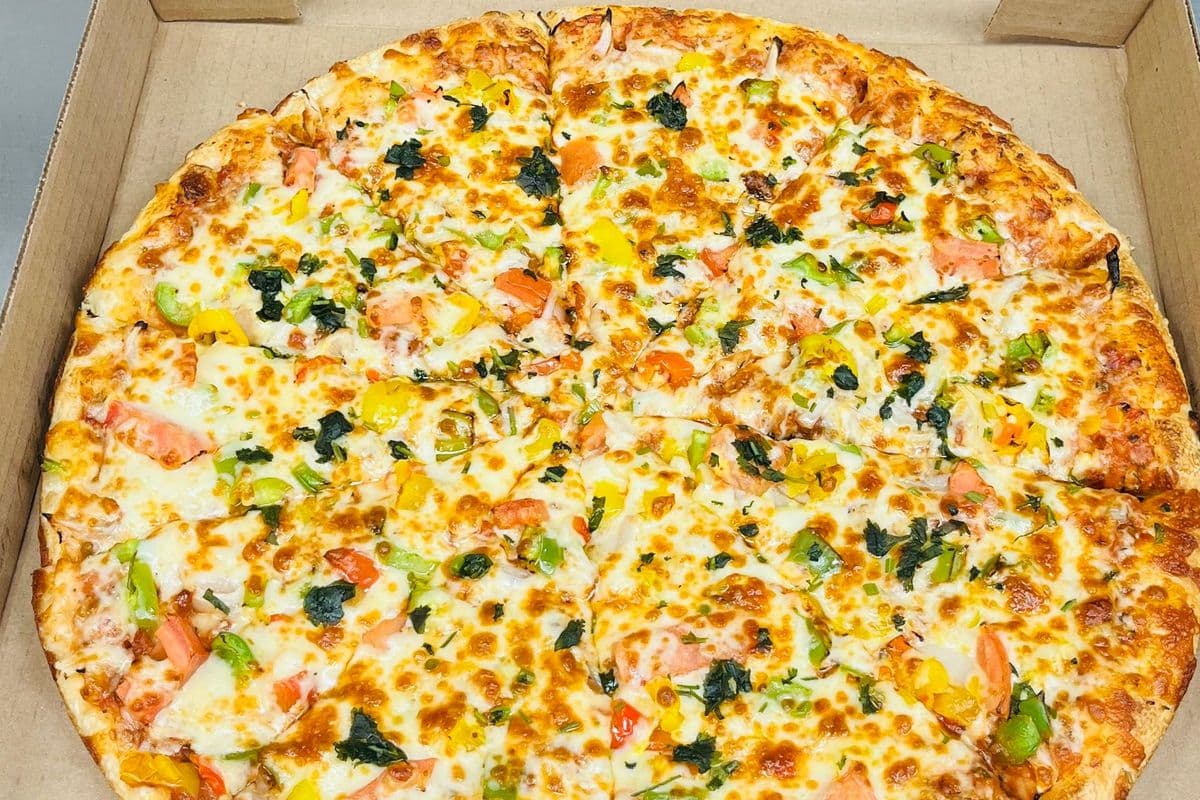 12" Medium Signature Punjabi-Style Veggie Pizza and Choice of Second Pizza