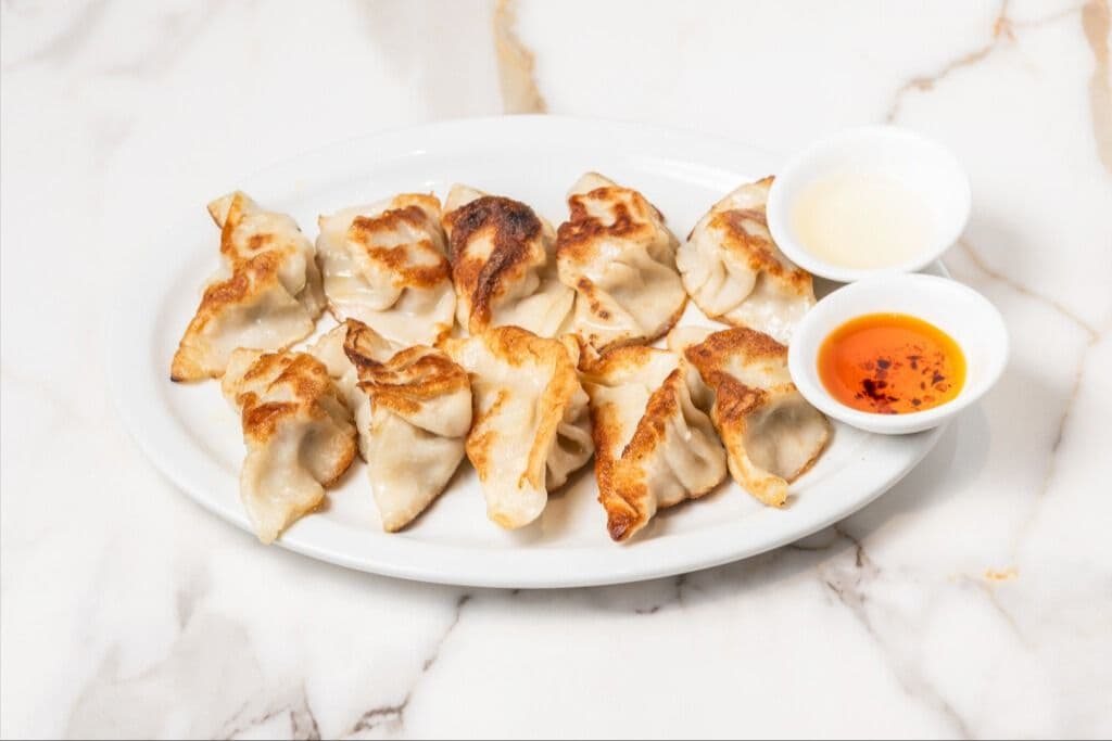 7. Grilled Pork Dumplings (10) / 放鍋貼: