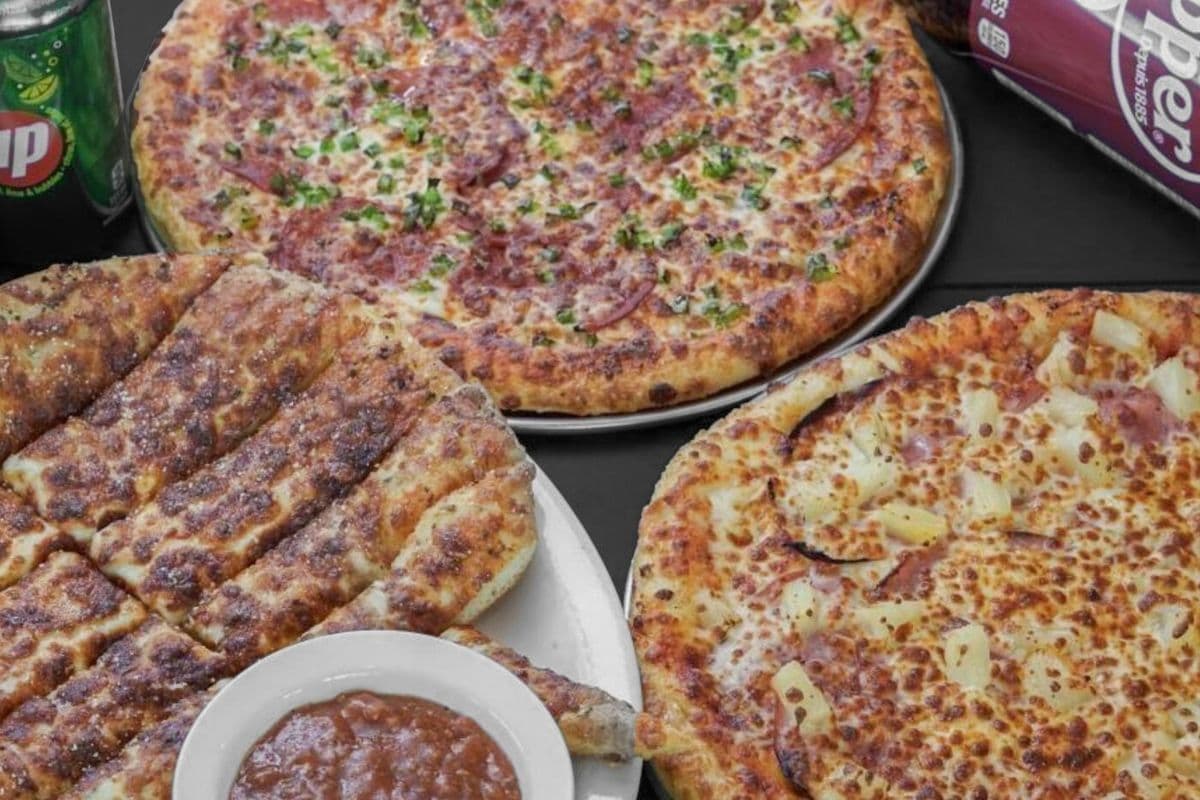 Two 12" Medium Three-Topping Pizzas with 10" Cheesy Bread and Canned Pop (4 pcs)