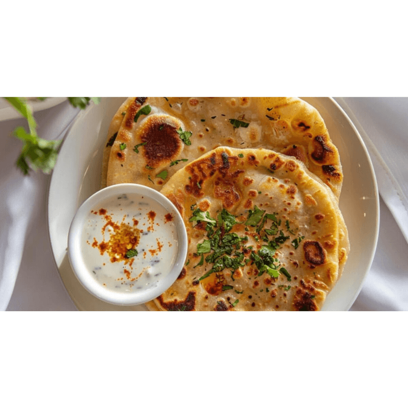 Aloo Paratha (2 pcs) served with yogurt