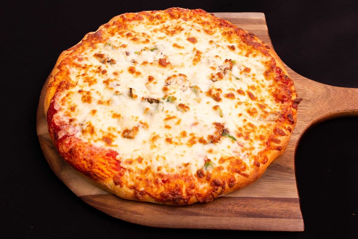 Pizza large toute garnie
