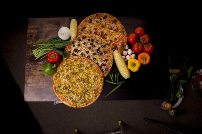 Extra-Large Mr. Singh's Triple Three-Topping Pizza with Three Dipping Sauces