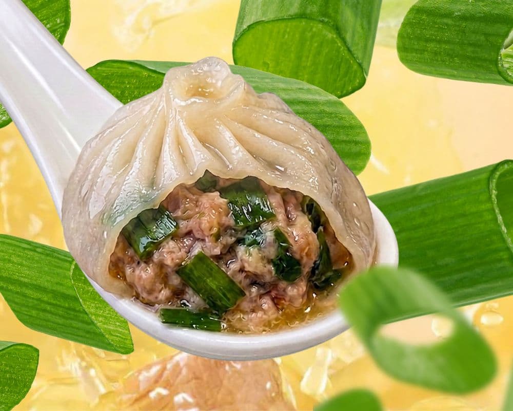 13. Juicy Pork & Chive Dumpling / Porc & Ciboulette Xiao Long Bao