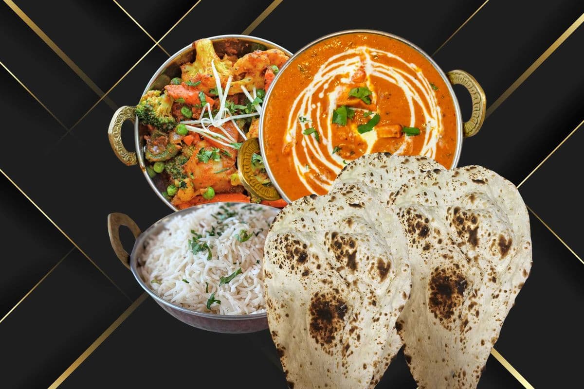 Butter Chicken, Rice, Mixed Vegetables, and Three Pieces of Naan
