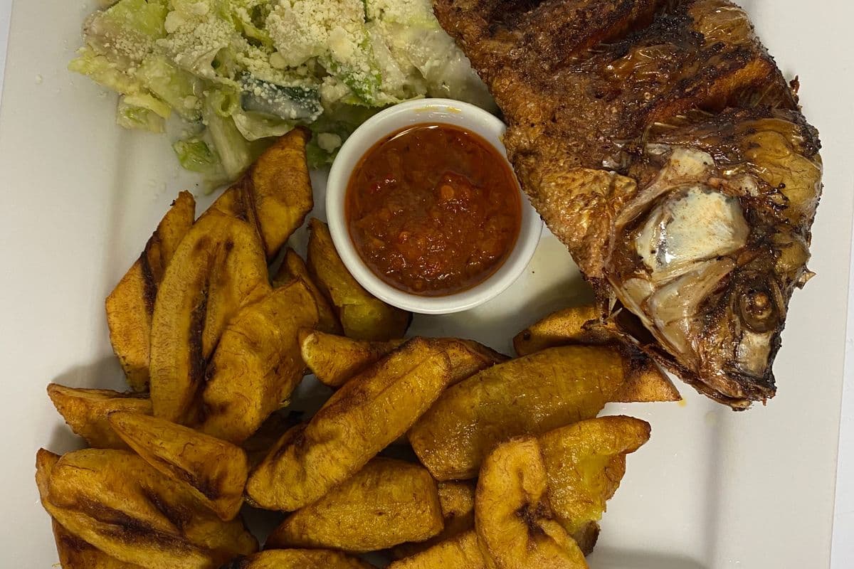 Caesar Salad with Fried Fish and Plantains