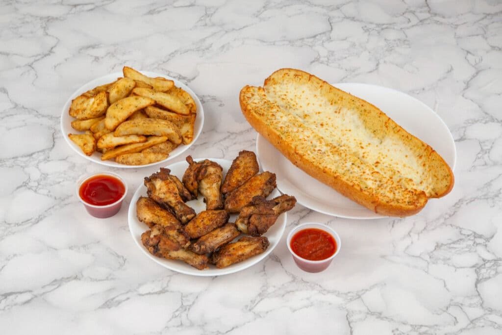 50 Chicken Wings, with 2 Garlic Breads and 2 Dipping Sauce (app. 5 LB of Wings)