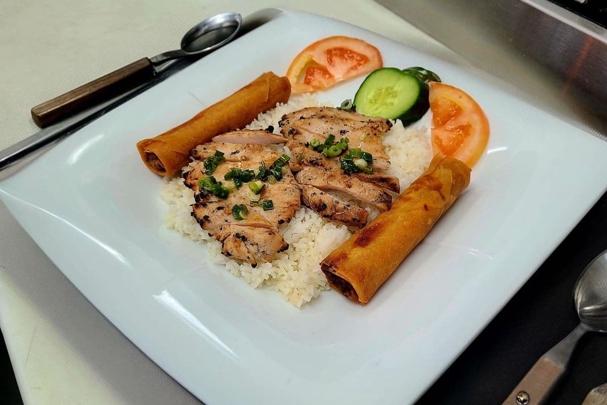 42. Charbroiled Lemon Grass Chicken and Spring Rolls on Steamed Rice