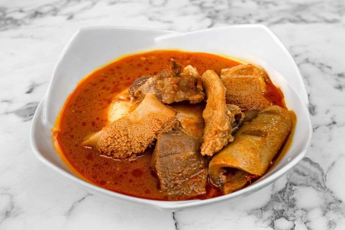 Fufu With Light Soup And Assorted Meat