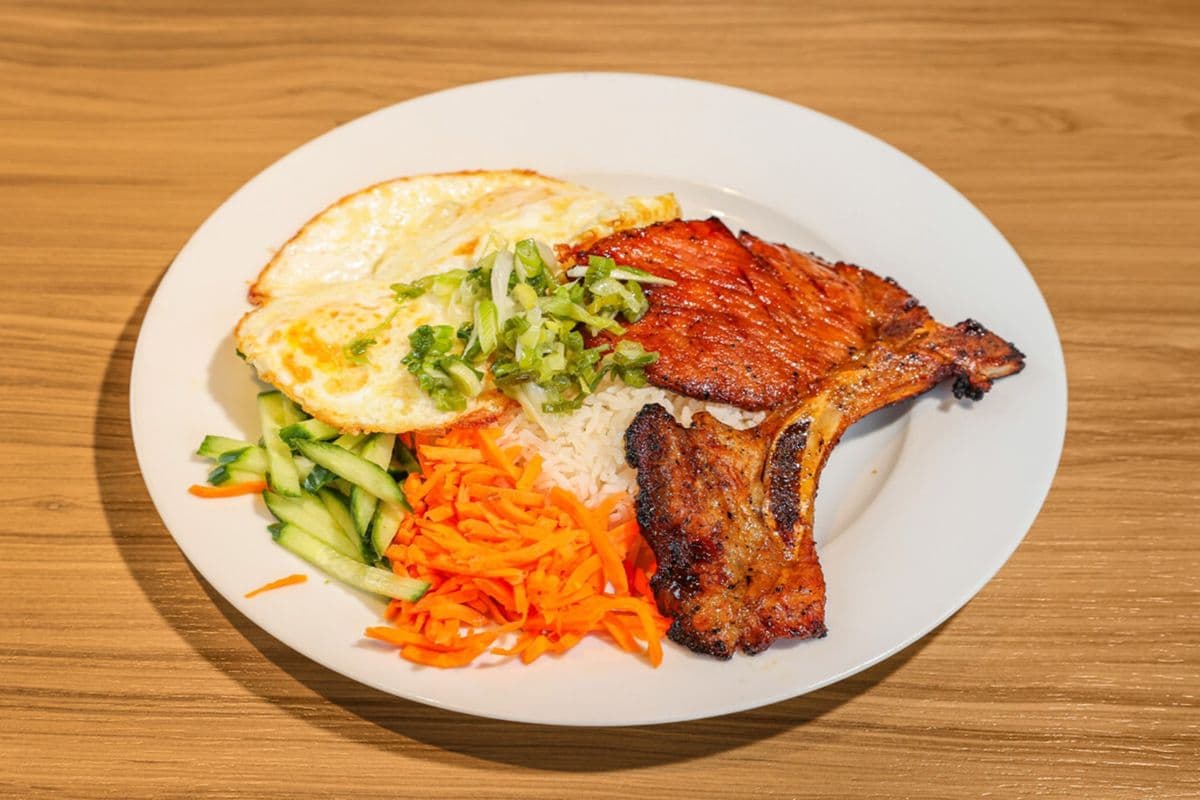 48. Grilled Pork Chop (1 pc) and Fried Eggs (2 pcs) on Steamed Rice