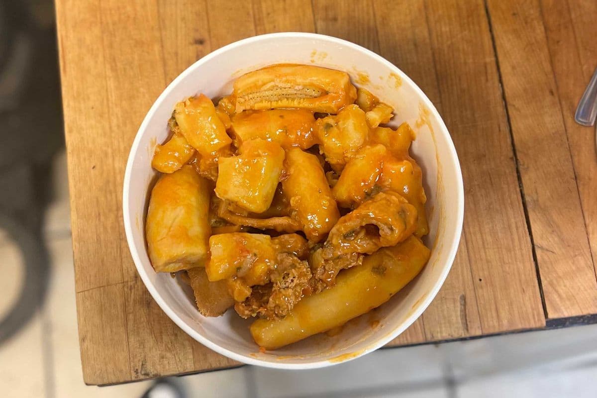 Matoke (cooked green banana with meat and intestine)