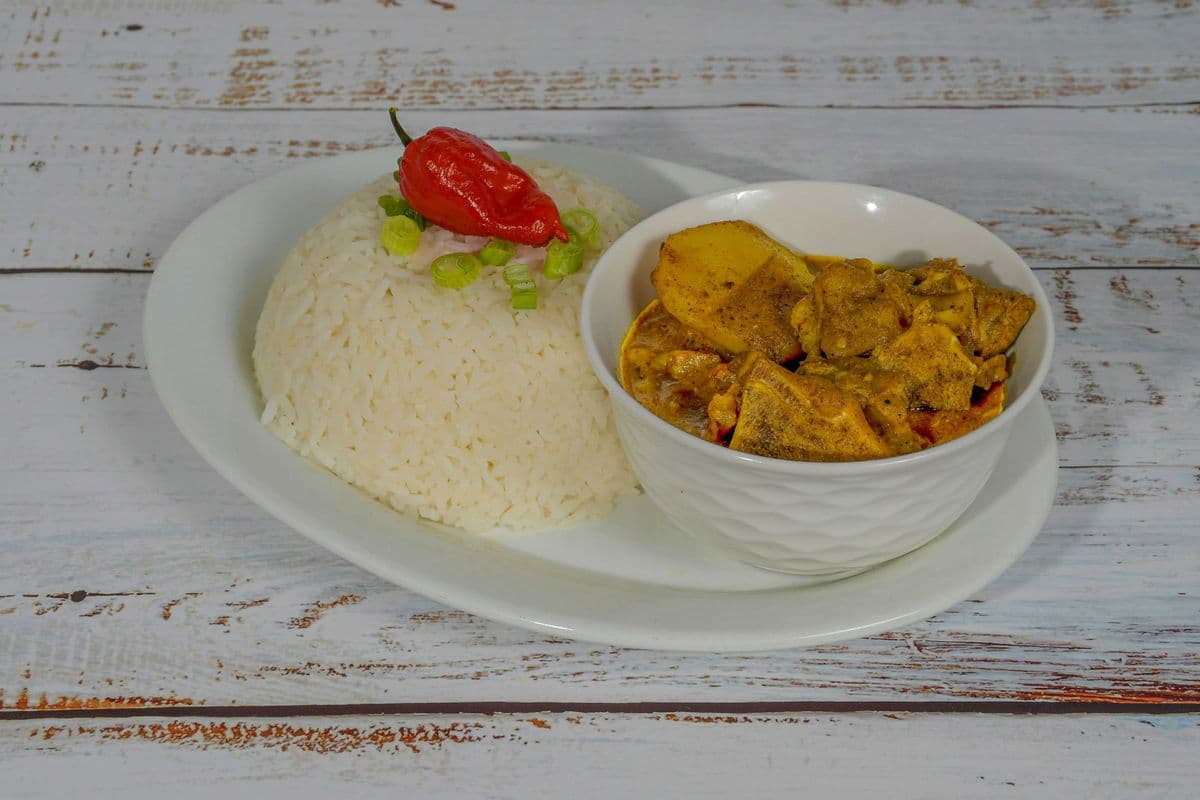 BONE GOAT CURRY (RICE OF ROTI)