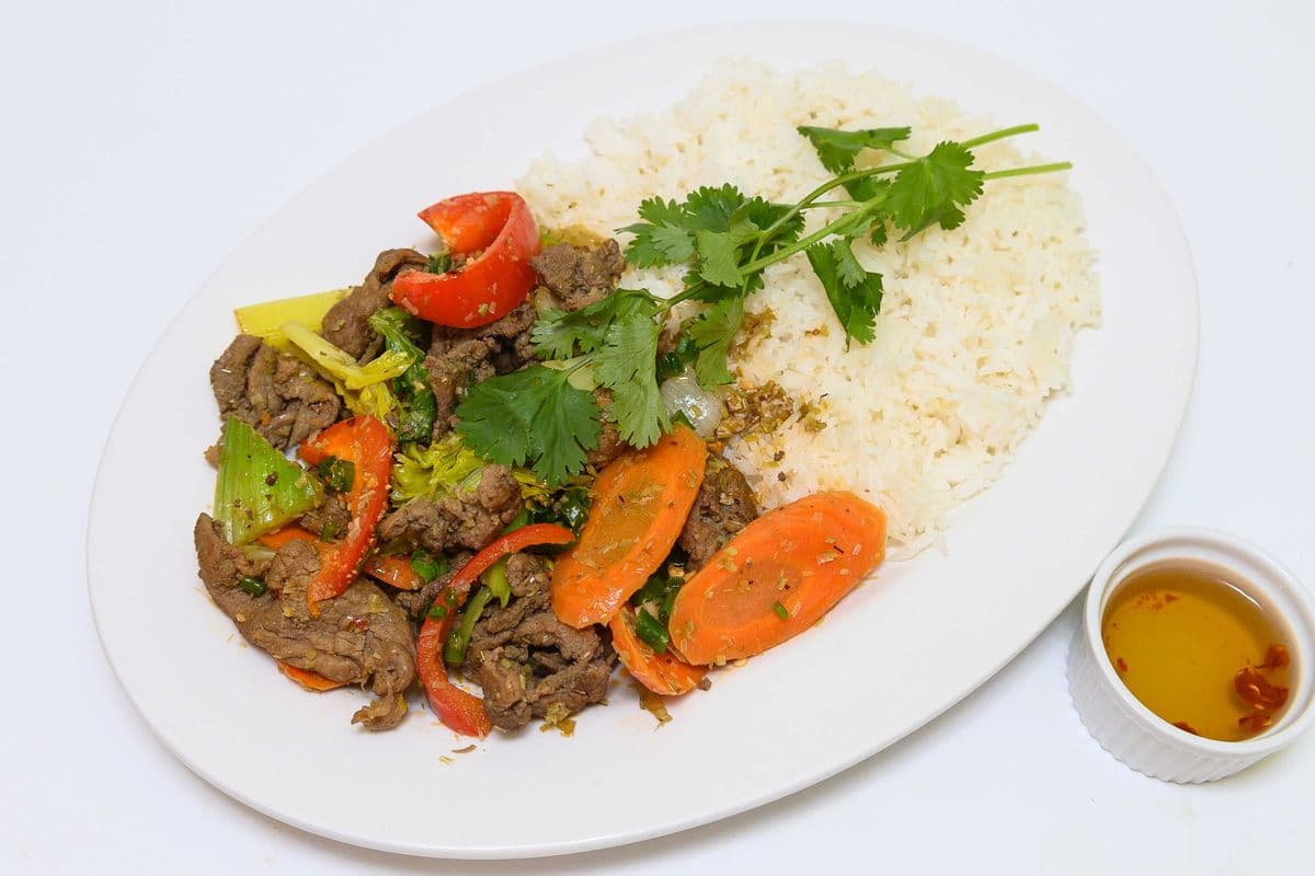 76. Spicy Stir-Fried Lemongrass Beef and Vegetables on Steamed Rice