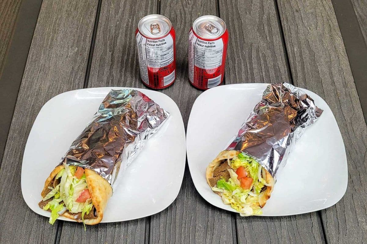 Two Deluxe Donair with Cheese and Two Cans of Pops