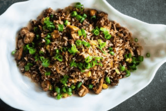 Stir Fried Crispy Rice with Foie Gras and Beijing Duck and Dried Scallop in Truffle and Soy Sauce (松露鹅肝瑶柱烤鸭炒双米)