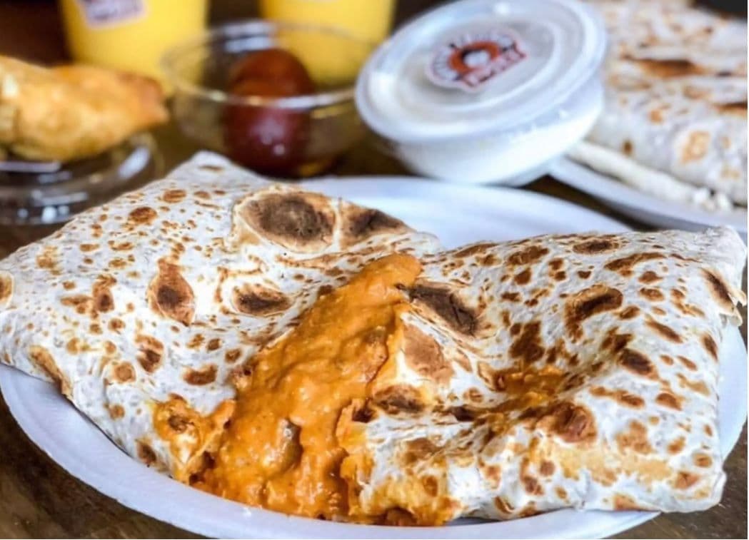 Buy 1 get 1 free Signature Butter Chicken Roti
