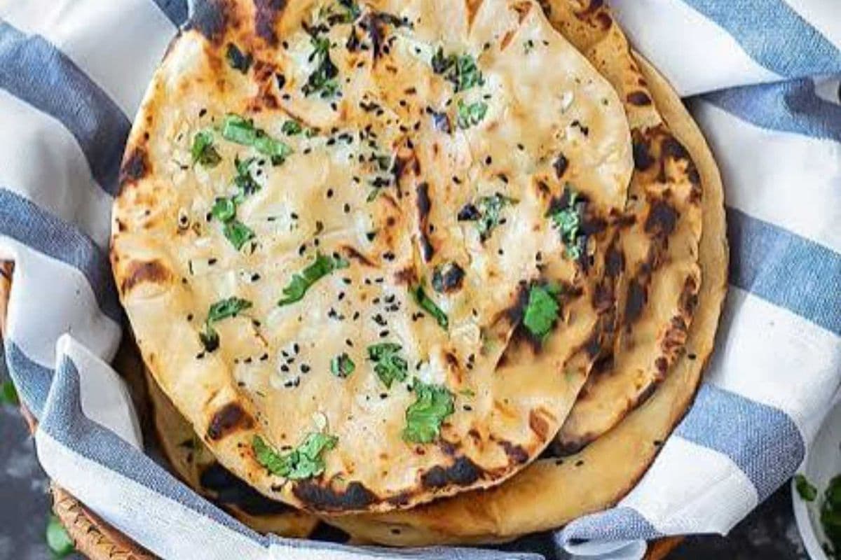 Onion Paratha TANDOORI (Complementary Pickle & Raita)