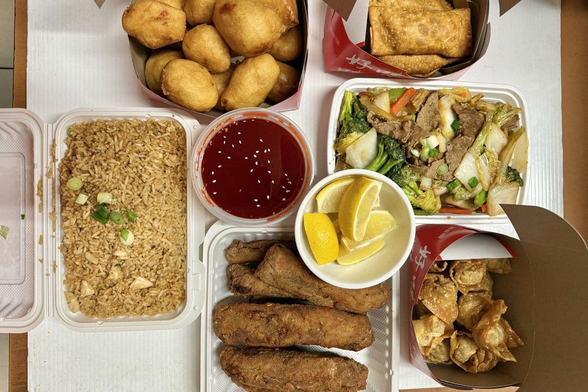 Dinner for 4( (4) egg rolls, (12) balls, (8) bons+le, (16) wontons, beef greens, and 1 rice, 16 oz sauce)