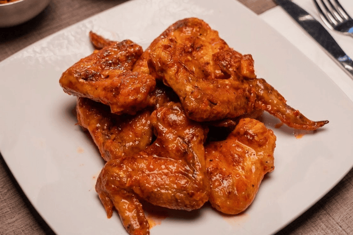 Charcoal-Cooked Wings - Four Pieces Uncut - One Half Pound