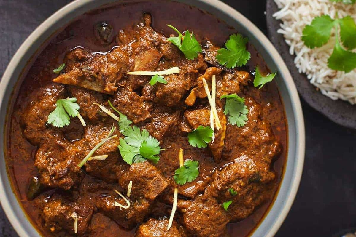 Goat Curry Free 1 Butter Naan & Half Rice