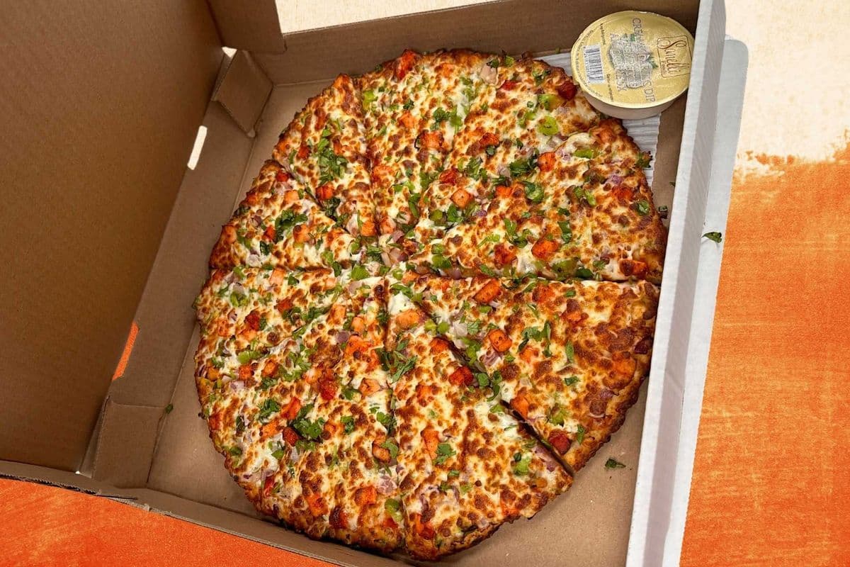 Medium Desi Style Pizza and Appetizer Deal (1 Free Dip)