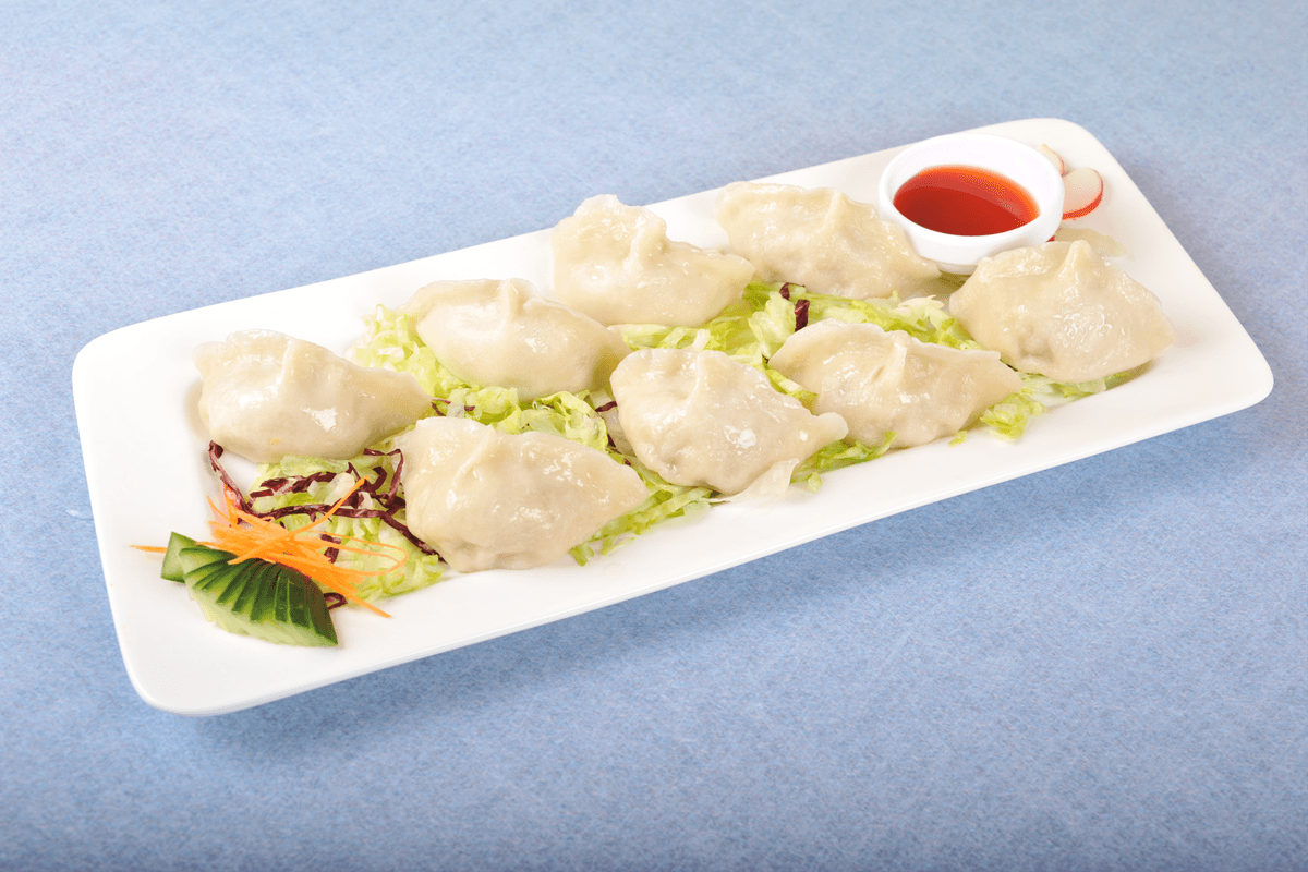 9. Steamed Pork or Chicken Dumplings (8 pcs)