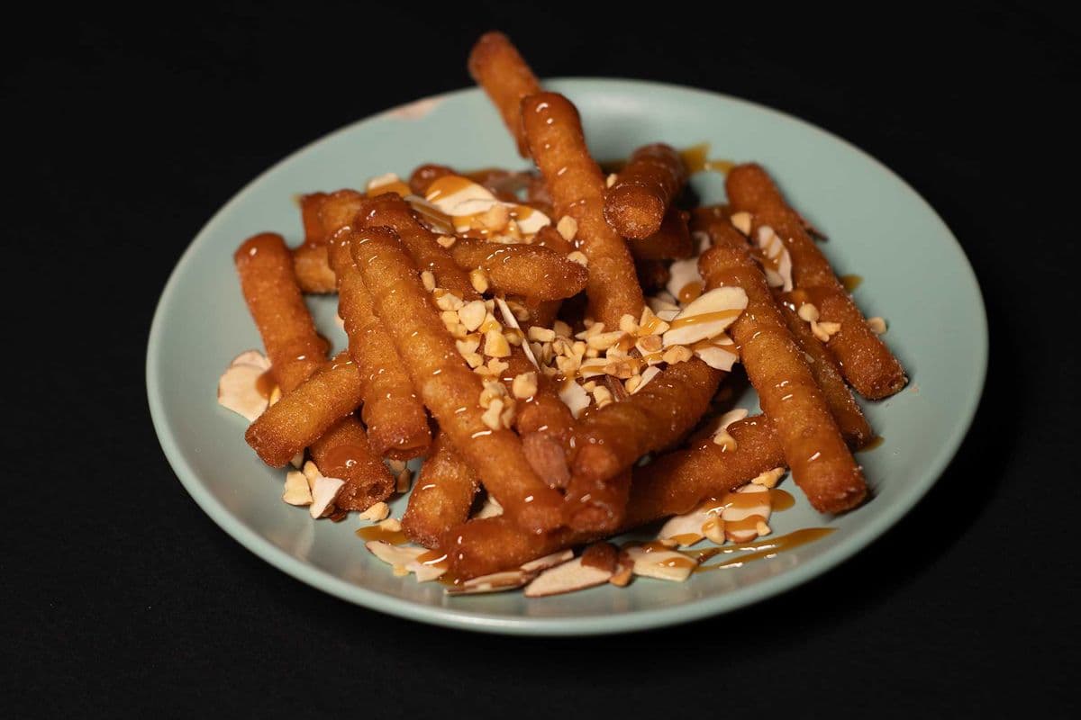 Nutty caramel funnel cake poutine