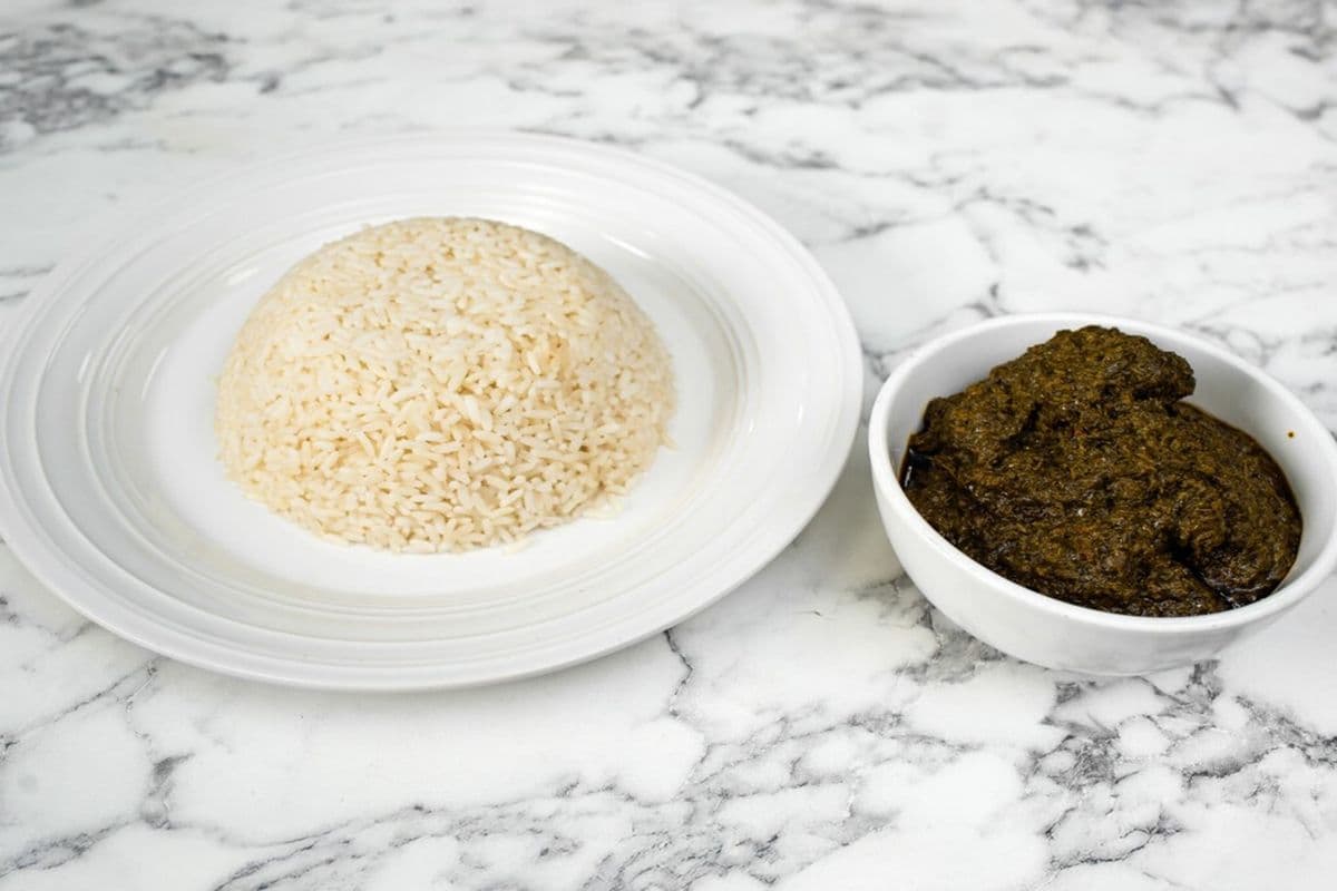 Steam Rice With Cassava Leafs And Goat