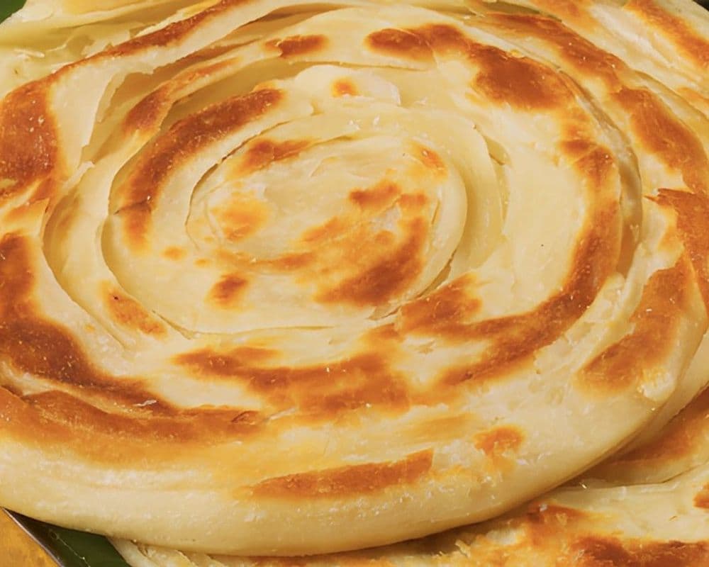 KERELA PAROTTA WITH BUTTER CHICKEN