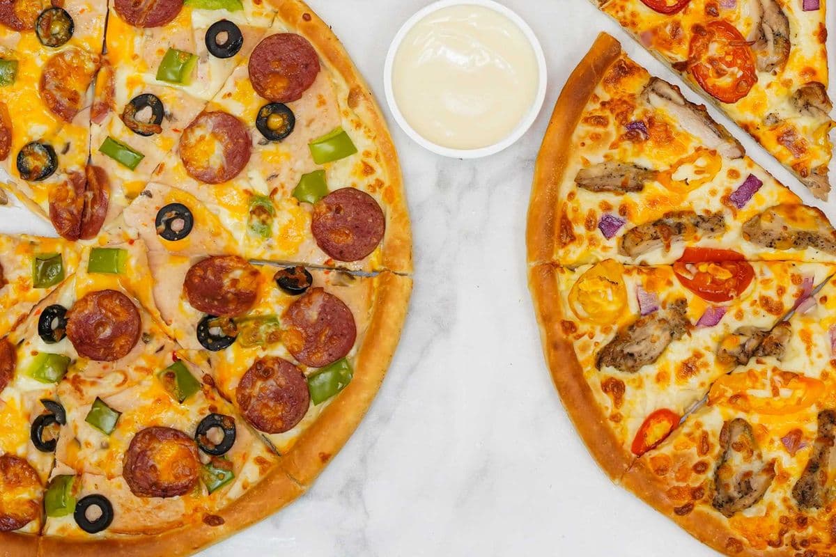 Two medium specialty pizza