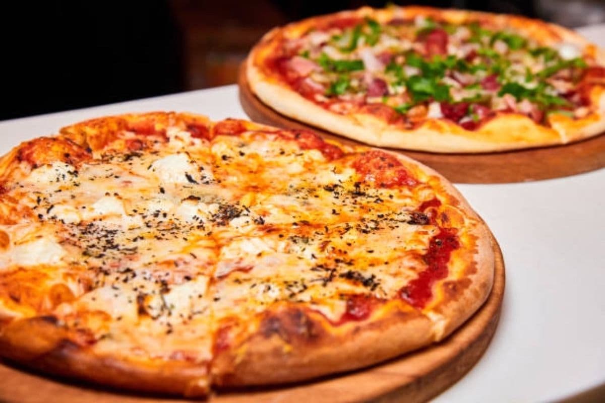 Two small Pizzas with Two Toppings combined