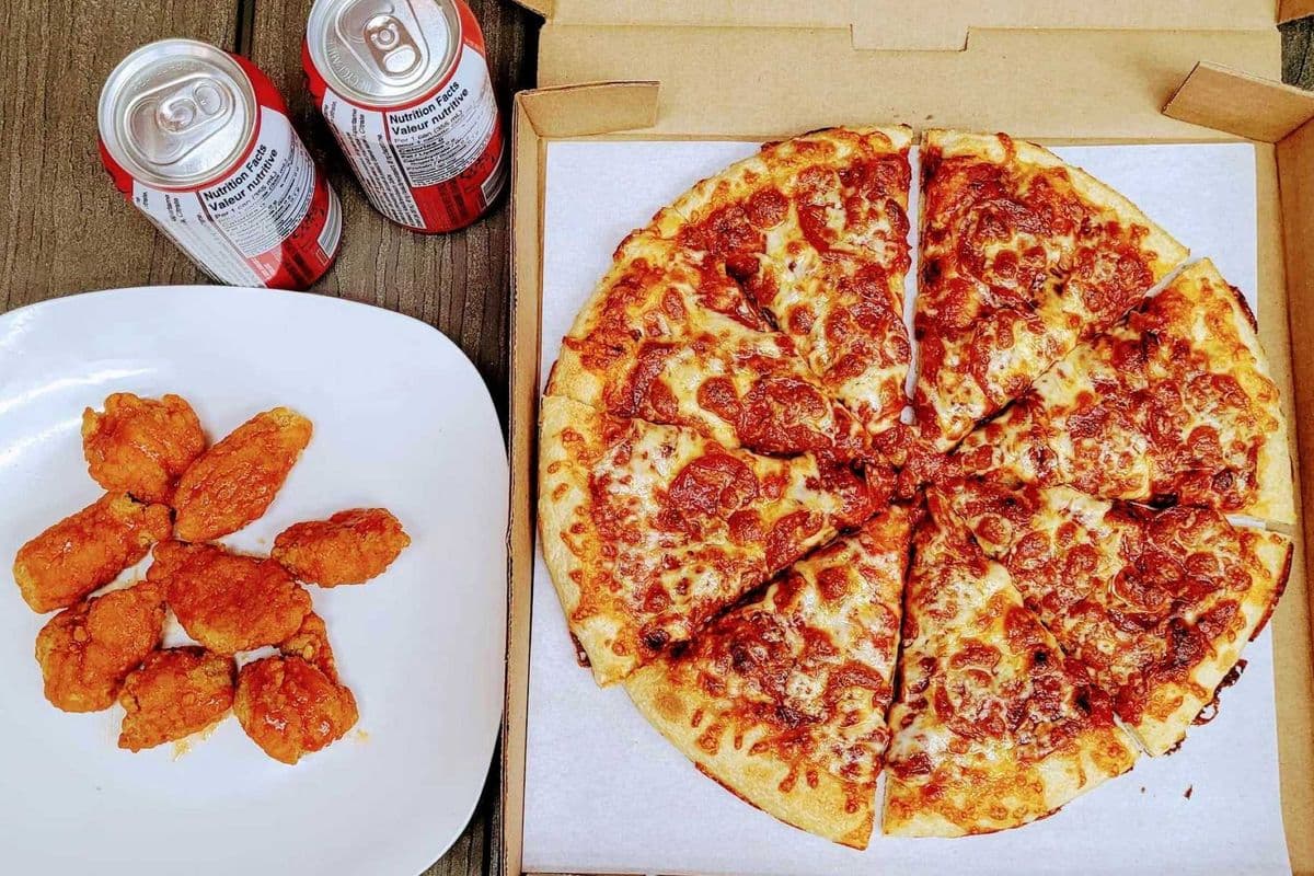 Large Two Topping Pizza, Eight Chicken Bites and Two Cans of Pops