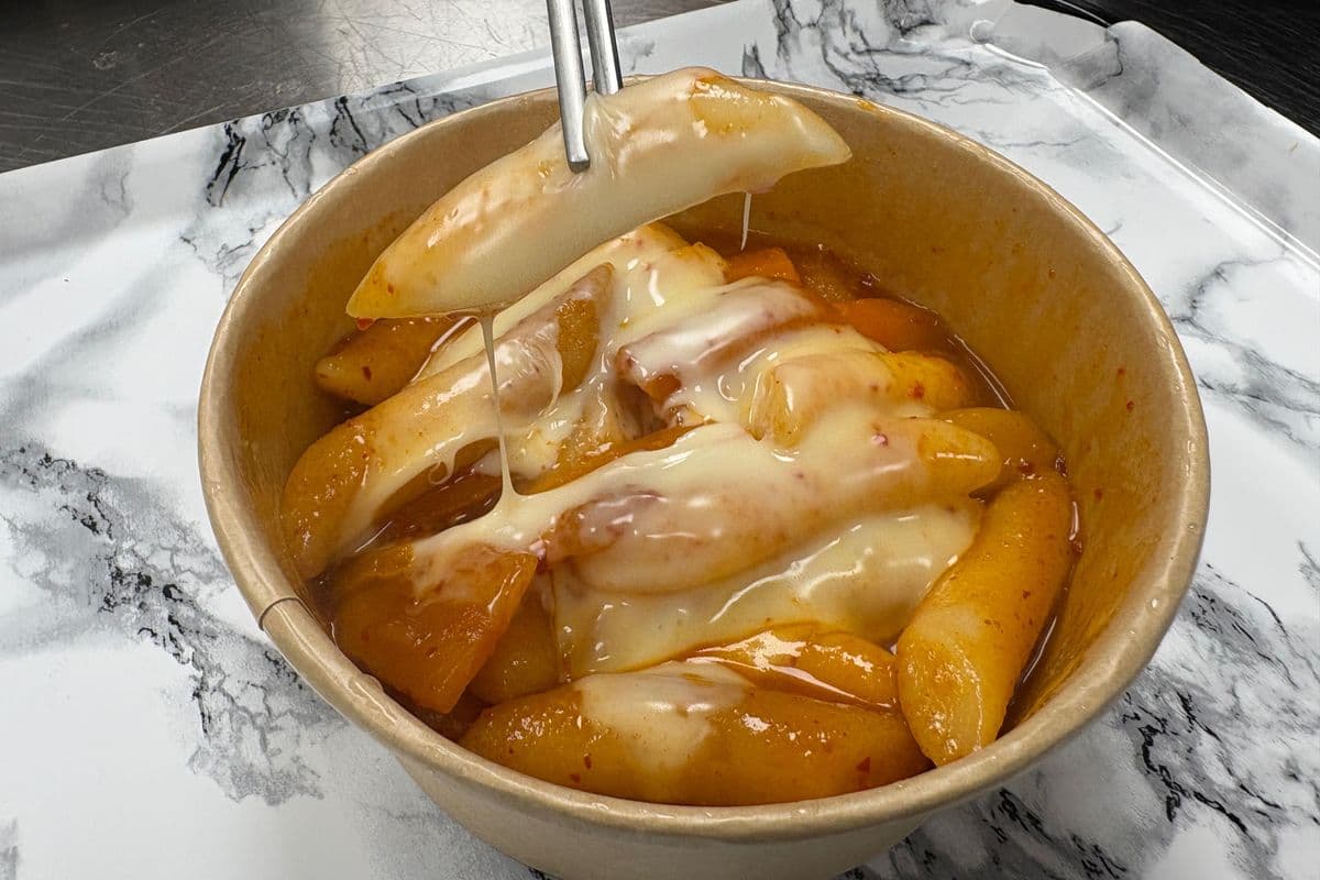 11. CHEESY TTEOKBOKKI Korean Spicy Rice Cakes with Melted Mozzarella