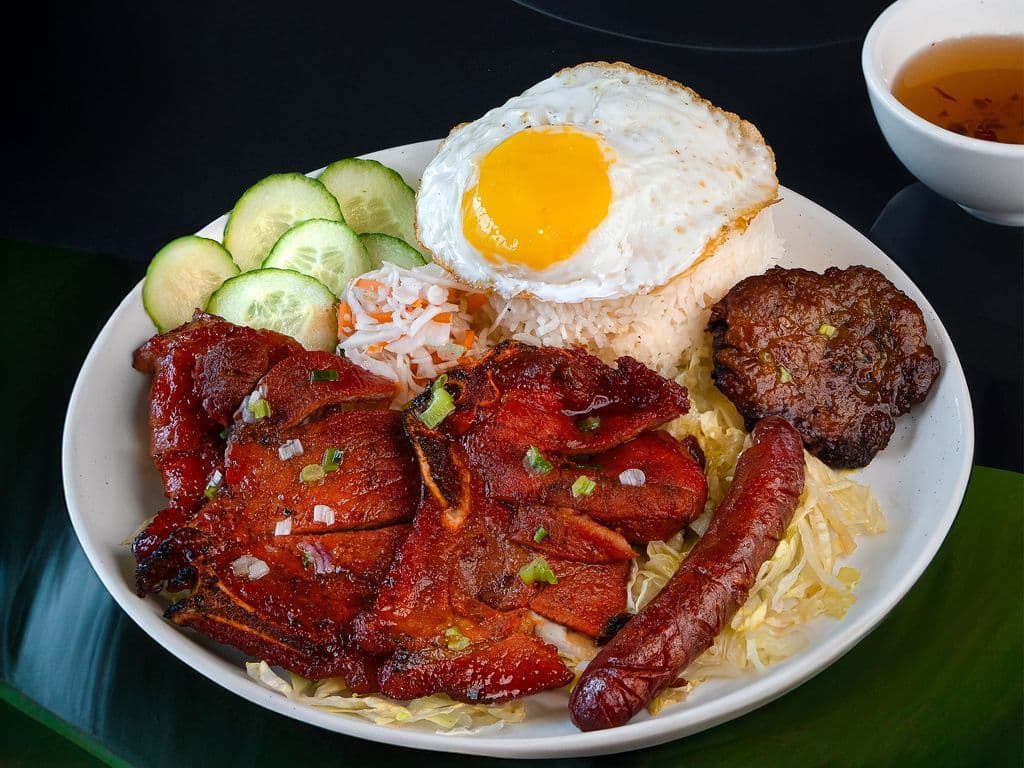 35.Deluxe rice dish (pork chop, fried egg ,sausage and meat balls)