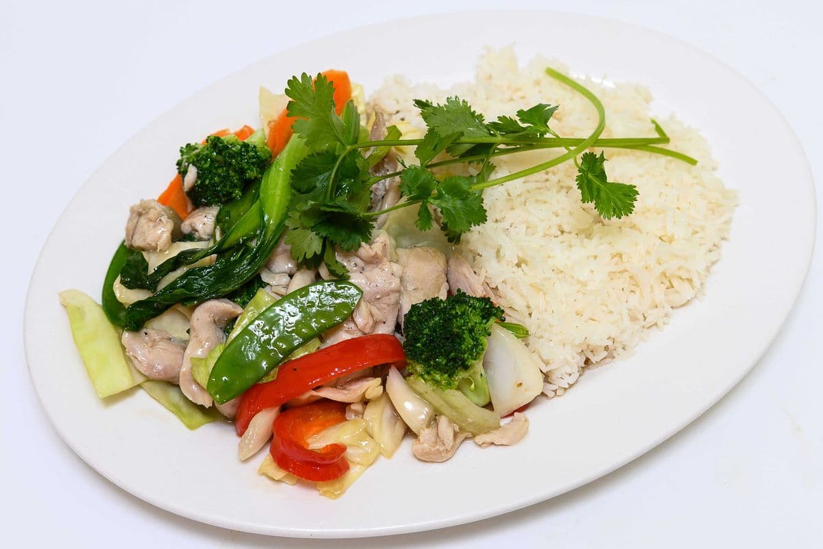 79. Stir-Fried Chicken and Vegetables on Steamed Rice