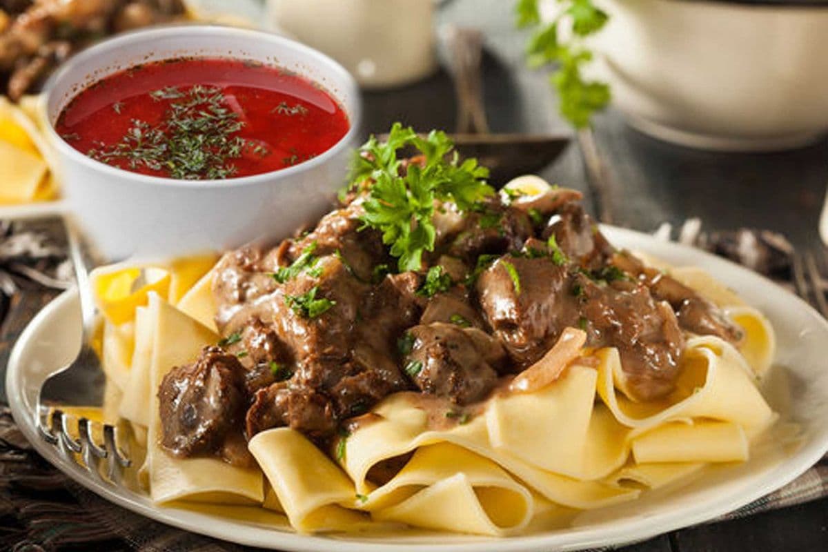 Beef Stroganoff: Beef over Side + Borscht (12 oz)+ Bread + Sour Cream