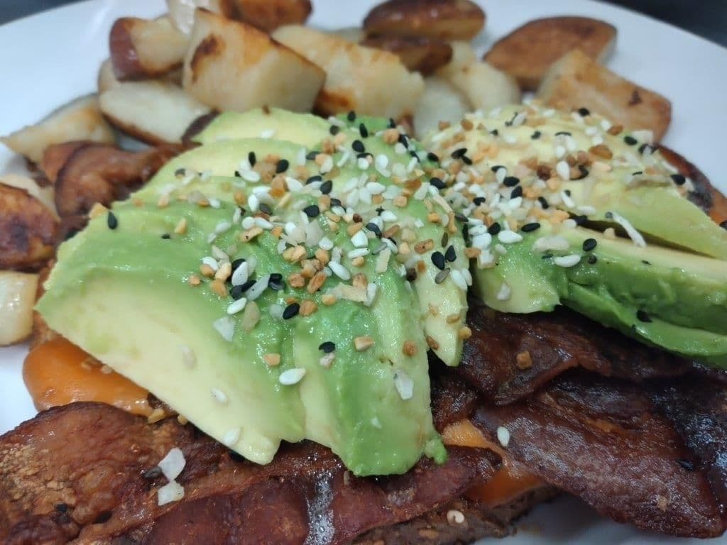 Eggs Benedict Avocado and Cheddar