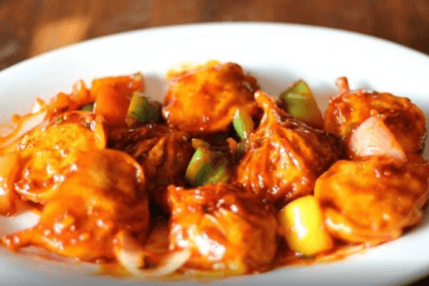 Chicken Gravy Momos (7 pcs)
