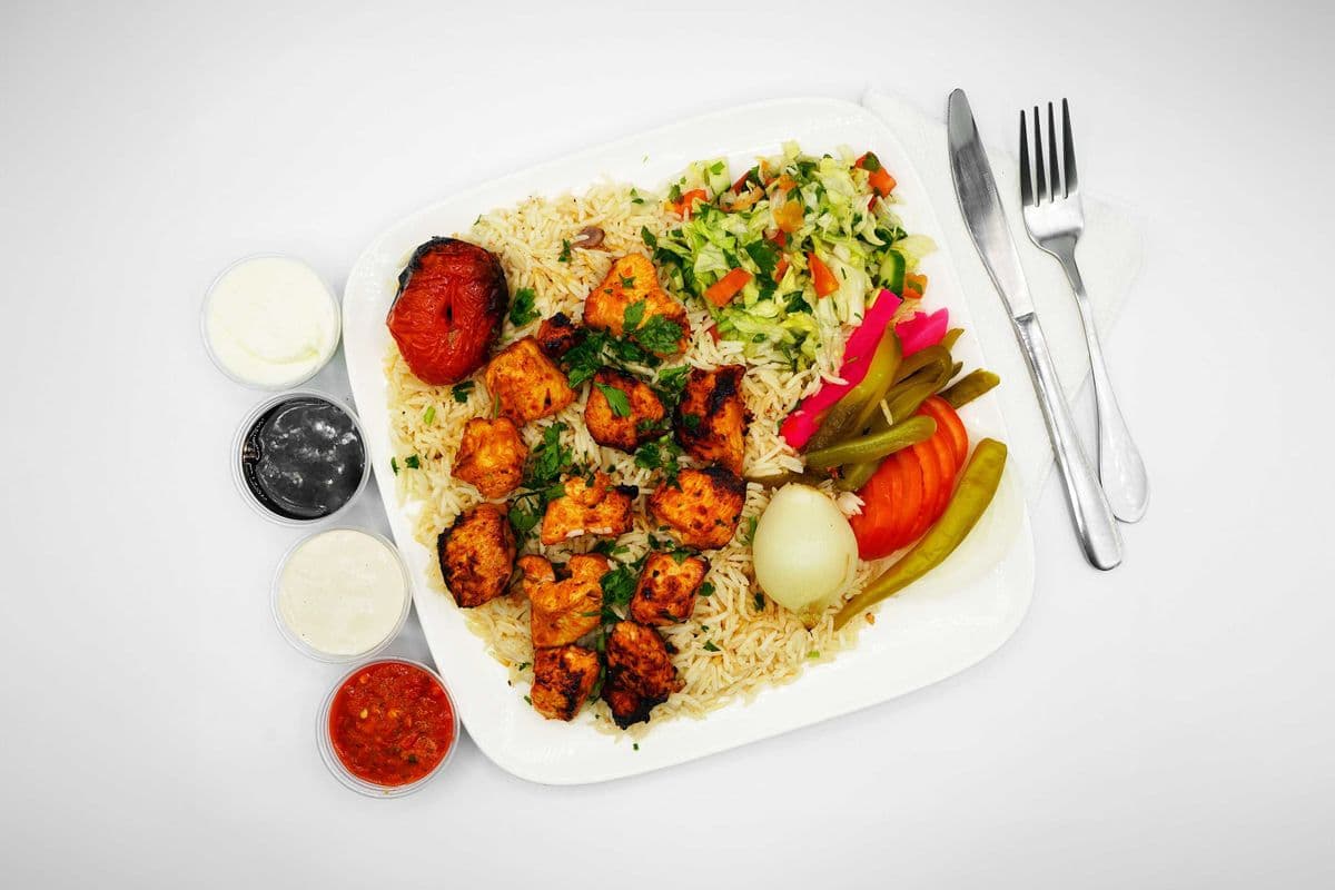 Chicken Tikka rice and salad meal