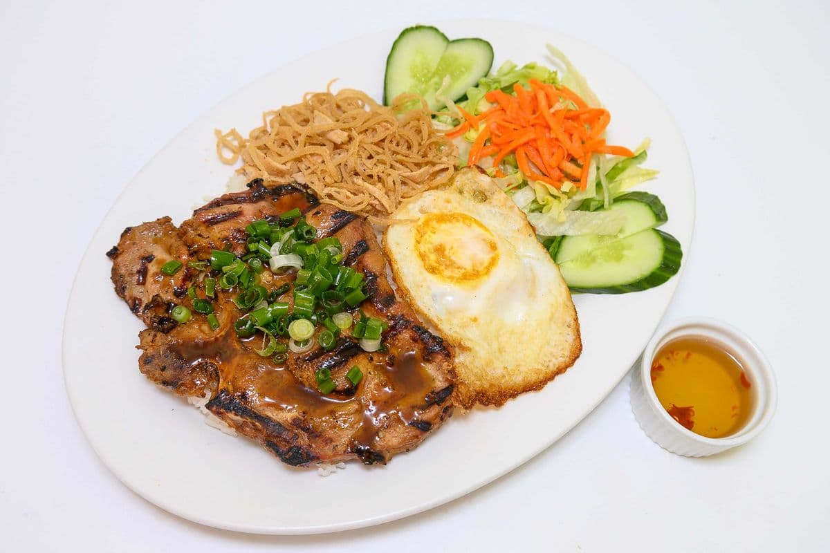 67. Grilled Pork Chop, Fried Egg, and Shredded Pork Skin on Steamed Rice