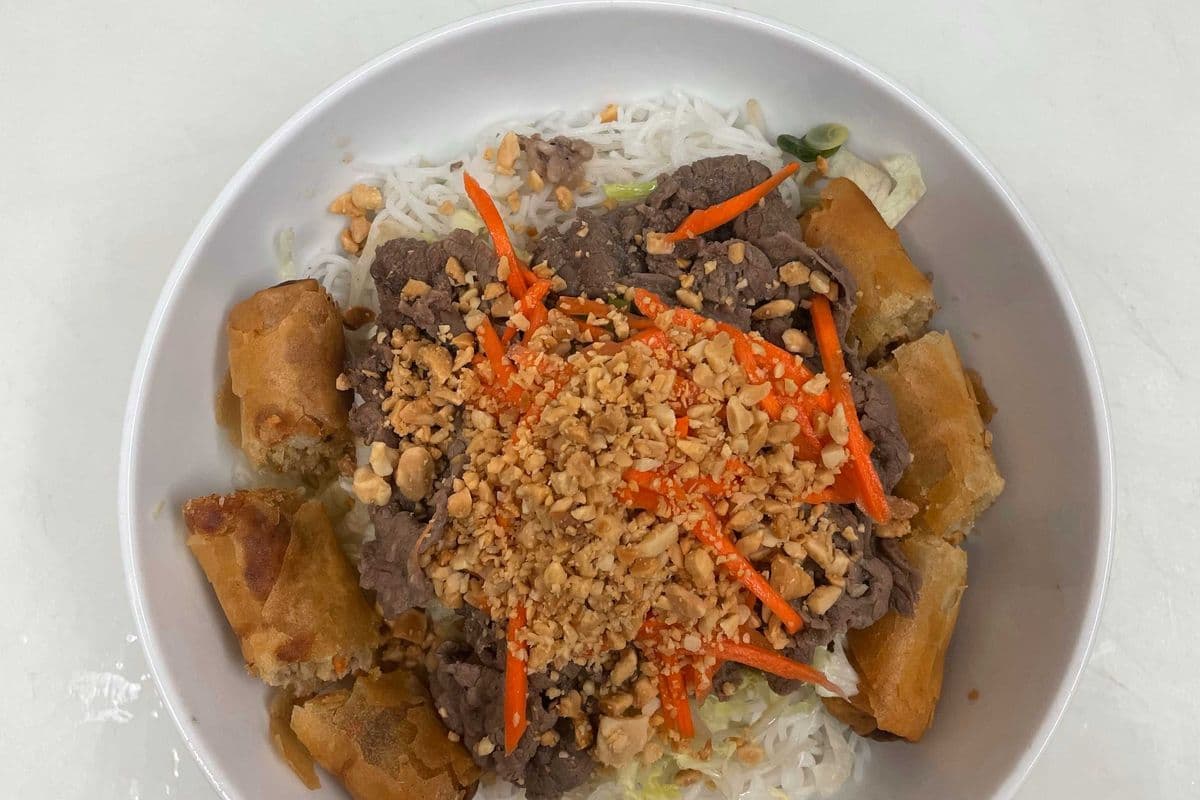 26. Charbroiled Beef and Spring Rolls on Rice Vermicelli