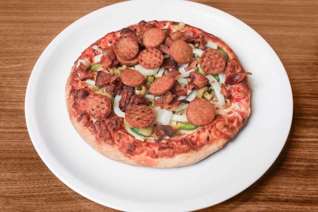 7. Petite pizza 10" carnivore