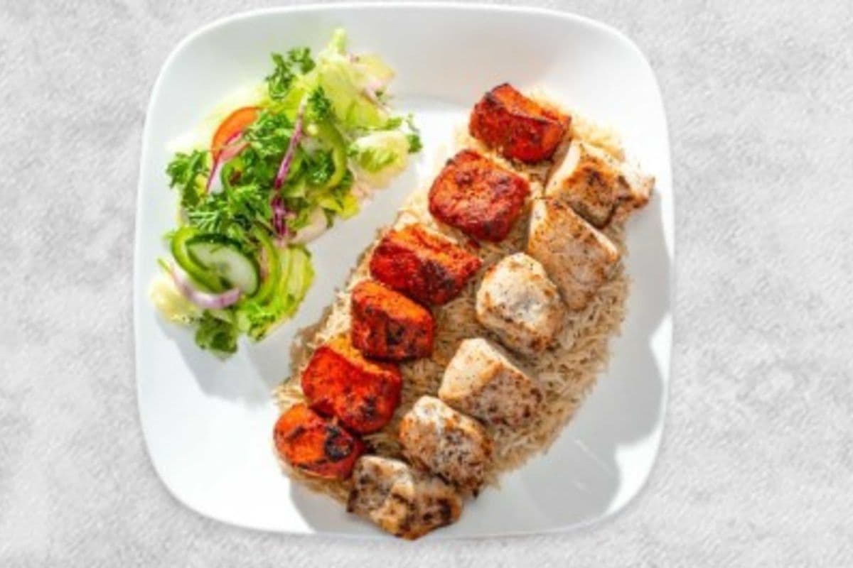 Twin Chicken Tikka Over Salad