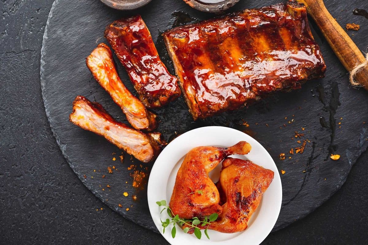 Fire Grilled Dino Beef Ribs and Quarter chicken